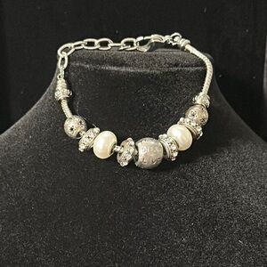 Elegant Silver and Cream Beaded Bracelet